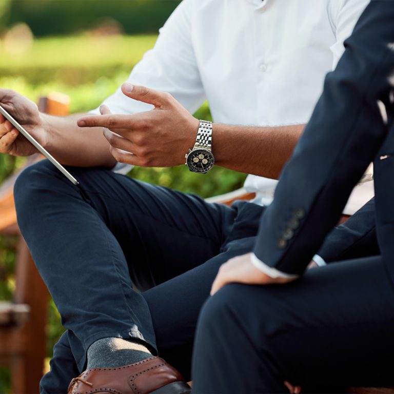 hastings-by-the-bay-professional-talking-in-park